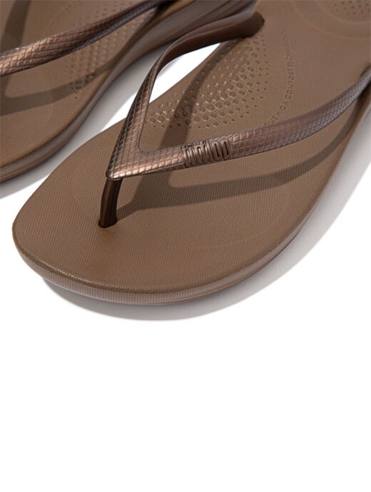 bronze flip flops
